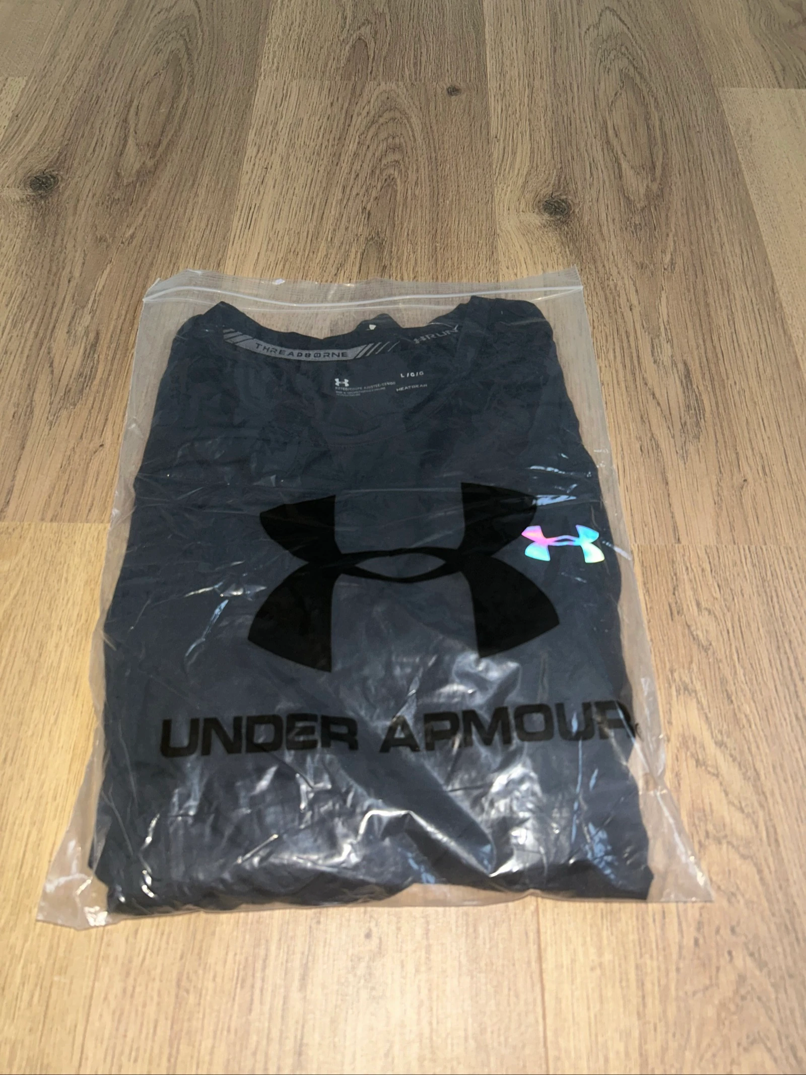 Camiseta Under Armour Negra – photo 6